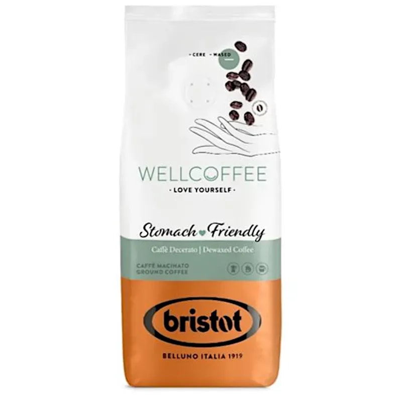 Opakowanie kawy Wellcoffee, oznaczonej jako przyjazna dla żołądka, z widocznymi ziarenkami kawy w tle. Doskonały wybór dla osób szukających łagodnego smaku kawy, idealny do codziennego parzenia i delektowania się aromatem.