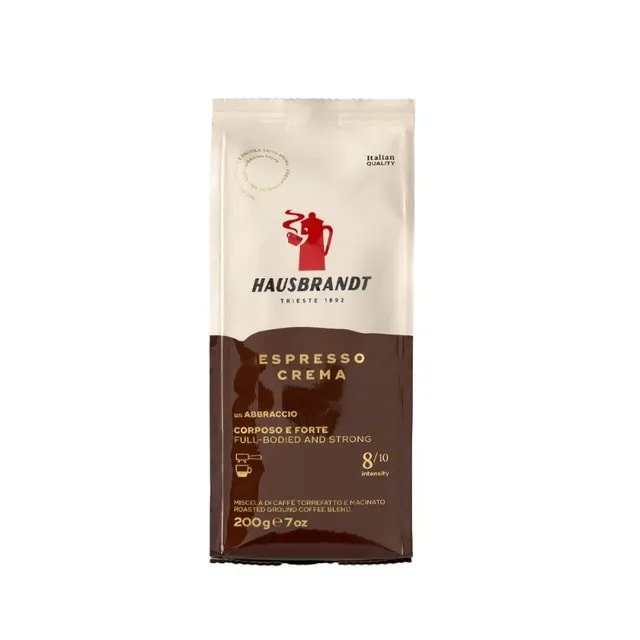 Opakowanie kawy mielonej Espresso Crema od Hausbrandt, idealnej dla miłośników intensywnego smaku. Opisuje nuty pełni i siły, idealne do przygotowania aromatycznego espresso w domowym zaciszu.