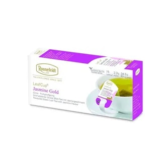 Opakowanie herbaty Ronnefeldt LeafCup Jasmin Gold. Zawiera 15 saszetek herbaty liściastej o smaku Jasmin Gold. Widoczna filiżanka z zaparzoną herbatą i torebką Ronnefeldt. Na opakowaniu znajduje się logo marki, oraz informacje o gramaturze: 2,3g x 15 sztuk (34,5g netto).