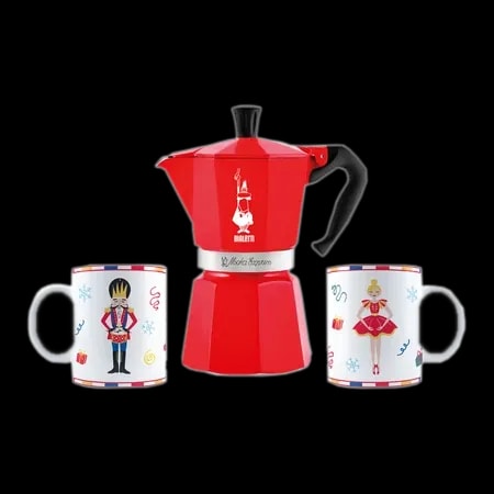 Zestaw Bialetti Moka Express Nutcracker składa się z czerwonej kawiarki Moka Express o pojemności 6 filiżanek oraz dwóch porcelanowych kubków ozdobionych świątecznym motywem dziadka do orzechów i baletnicy. Doskonały do przygotowania tradycyjnej włoskiej kawy espresso, kawiarka łączy funkcjonalność z pięknym, świątecznym designem, co czyni ją idealnym prezentem na święta.
