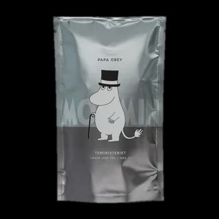 Srebrne opakowanie herbaty liściastej Moomin Papa Grey od Teministeriet o pojemności 100g. Na opakowaniu znajduje się grafika postaci Taty Muminka w cylindrze i z laską, na tle napisu 'Moomin'. Herbata w eleganckim, minimalistycznym designie, idealna dla fanów Muminków.