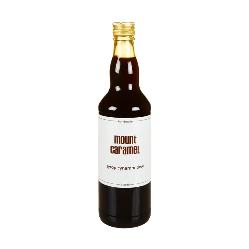 Obraz przedstawia butelkę syropu cynamonowego Mount Caramel o pojemności 500 ml. Ręcznie produkowany syrop idealnie nadaje się do aromatyzowania kawy, herbaty i deserów, wzbogacając ich smak o intensywną nutę cynamonu.