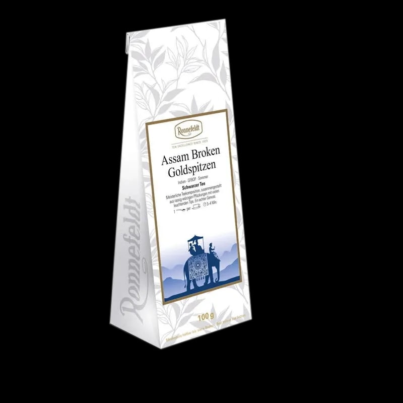 Opakowanie herbaty czarnej Ronnefeldt Assam Broken Goldspitzen, 100g. Herbata z regionu Assam w Indiach, charakteryzująca się pełnym i intensywnym smakiem oraz złocistymi liśćmi.