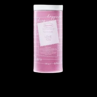 Różowa puszka z herbatą Ronnefeldt Tea Couture Love You, o pojemności 100 g. Zielona herbata z nutami pomarańczy, trawy cytrynowej i jagód, idealna na romantyczne chwile.