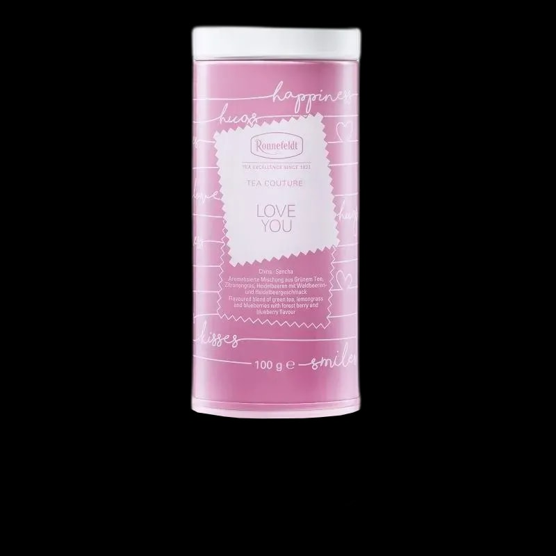 Różowa puszka z herbatą Ronnefeldt Tea Couture Love You, o pojemności 100 g. Zielona herbata z nutami pomarańczy, trawy cytrynowej i jagód, idealna na romantyczne chwile.
