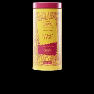 Żółta puszka z herbatą Ronnefeldt Tea Couture Masala Chai, o pojemności 100 g. Aromatyczna czarna herbata z Indii, wzbogacona mieszanką przypraw, idealna na zimowe wieczory.