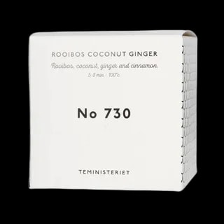 Opakowanie herbaty Teministeriet No 730 Rooibos Coconut Ginger. Eleganckie, białe pudełko z czarnymi napisami, zawierające mieszankę rooibosa z kokosem, imbirem i cynamonem. Idealna na relaksujące chwile z intensywnym smakiem i aromatem.