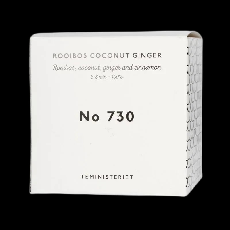 Opakowanie herbaty Teministeriet No 730 Rooibos Coconut Ginger. Eleganckie, białe pudełko z czarnymi napisami, zawierające mieszankę rooibosa z kokosem, imbirem i cynamonem. Idealna na relaksujące chwile z intensywnym smakiem i aromatem.