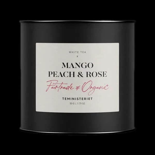 Czarna puszka herbaty Teministeriet Fairtrade Collection Mango Peach & Rose, organiczna biała herbata o smaku mango, brzoskwini i róży, 50g.