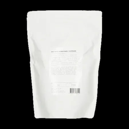 Widok tyłu opakowania herbaty White Elderflower 250g, zawierający informacje o składzie, pochodzeniu produktu oraz kod kreskowy.
