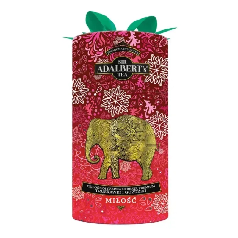 Opakowanie premium czarnej herbaty Ceylon z aromatycznymi truskawkami i goździkami, ozdobione grafiką słonia. Produkt wyróżnia się artystycznym designem i idealnie nadaje się na prezent dla miłośników herbaty oraz unikalnych smaków.