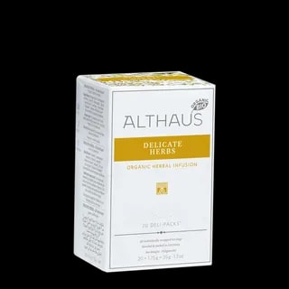 Opakowanie herbaty ziołowej Althaus Delicate Herbs, organiczna infuzja ziołowa, zawierające 20 indywidualnie pakowanych saszetek, z eleganckim żółto-białym designem, wyprodukowane w Niemczech