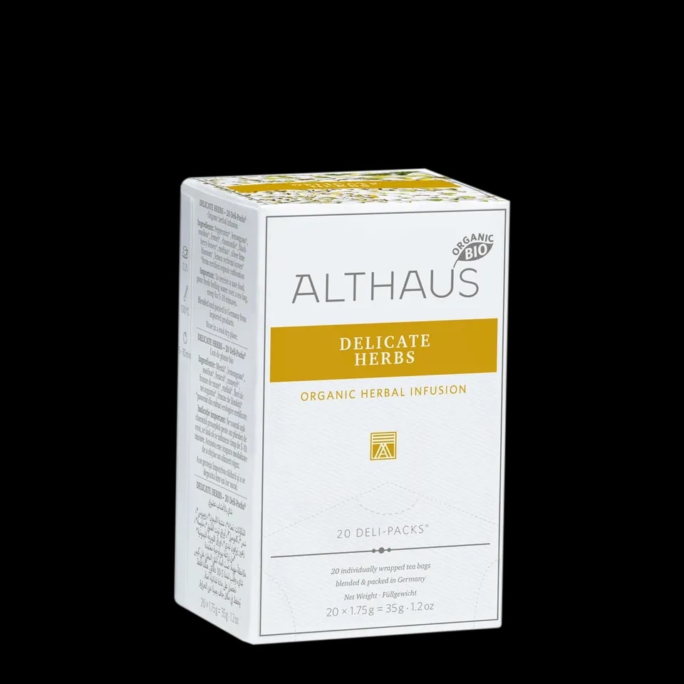 Opakowanie herbaty ziołowej Althaus Delicate Herbs, organiczna infuzja ziołowa, zawierające 20 indywidualnie pakowanych saszetek, z eleganckim żółto-białym designem, wyprodukowane w Niemczech