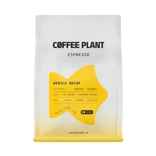 Opakowanie kawy Coffee Plant Gentle Decaf Espresso o wadze 250 g, z żółtą etykietą w kształcie fali. Na etykiecie widoczne informacje o pochodzeniu (Honduras, Kolumbia), obróbce CO2 i Sugarcane Washed oraz odmianach: Typica, Caturra, Castillo.