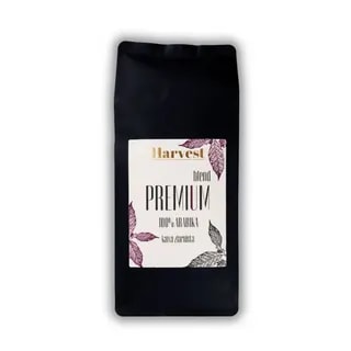 Opakowanie kawy Premium od Harvest, wykonane z 100% Arabiki, prezentuje elegancką etykietę z delikatnymi motywami roślinnymi. Idealna do przygotowania aromatycznego naparu, doskonała dla miłośników wysokiej jakości kawy.