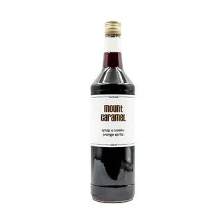 Szklana butelka syropu Mount Caramel o smaku orange spritz, idealna do kawy i napojów. Produkt ręcznie robiony, doskonały do wzbogacenia smaków zimnych i gorących napojów, dostępny w sklepie internetowym.