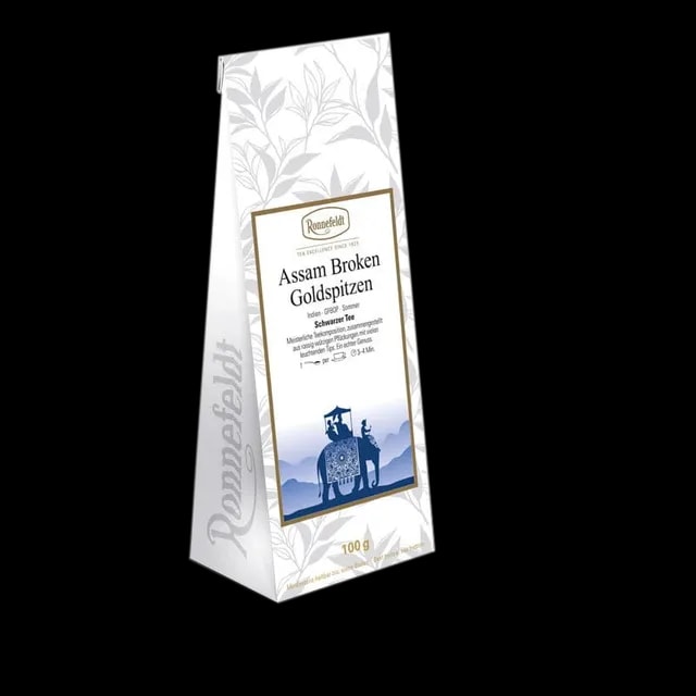 Opakowanie herbaty czarnej Ronnefeldt Assam Broken Goldspitzen, 100g. Herbata z regionu Assam w Indiach, charakteryzująca się pełnym i intensywnym smakiem oraz złocistymi liśćmi.