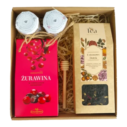 Zestaw prezentowy z produktami spożywczymi: żurawina w czekoladzie deserowej, herbata czarna Cytrusowy Dotyk, miód akacjowy, miód wielokwiatowy