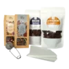 Zestaw prezentowy z produktami spożywczymi: herbata czarna Cytrusowy Dotyk, herbata czarna Złoto w Czerń, kawa ziarnista House Blend, kawa ziarnista Espresso Blend