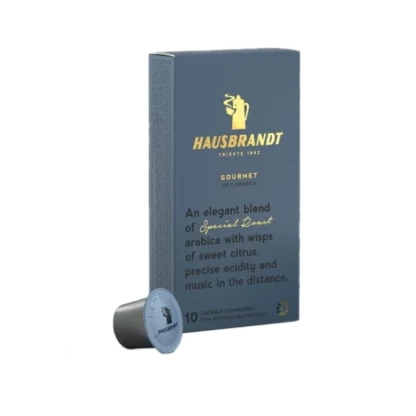 Eleganckie opakowanie kapsułek kawy Hausbrandt Gourmet z opisem 'Special Roast arabica', kompatybilne z Nespresso