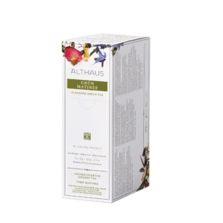 Opakowanie herbaty Althaus Grün Matinée, aromatyzowana zielona herbata, zawierające 15 większych saszetek, z eleganckim zielono-białym designem i wyraźnymi obrazami suszonych kwiatów, wyprodukowane w Niemczech