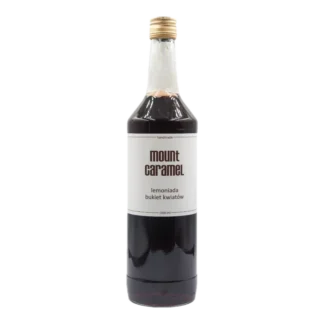 Duża przezroczysta butelka z ciemną lemoniadą 'Bukiet Kwiatów' Mount Carmel, ręcznie robiona, o pojemności 1000 ml, z białą etykietą informującą o smaku i marce