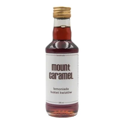 Mała przezroczysta butelka z ciemną lemoniadą 'Bukiet Kwiatów' Mount Carmel, ręcznie robiona, o pojemności 200 ml, z białą etykietą informującą o smaku i marce