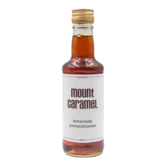 Mała przezroczysta butelka z lemoniadą pomarańczową Mount Carmel, ręcznie robiona, o pojemności 200 ml, z białą etykietą informującą o smaku i marce