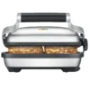 Grill i opiekacz do kanapek Sage SSG600BSS z solidną stalową obudową. Urządzenie wyposażone jest w wygodny uchwyt i wskaźnik świetlny na górze, który informuje o gotowości do pracy. Doskonale nadaje się do przygotowywania gorących kanapek o złocistym, chrupiącym wykończeniu, idealnych na szybkie śniadanie lub przekąskę.