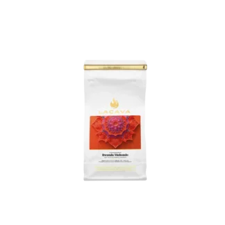 Opakowanie kawy LaCava Rwanda Muhondo, 250 g, z charakterystycznym pomarańczowym wzorem, kawa specialty o bogatym, owocowo-kwiatowym profilu smakowym z Rwandy.