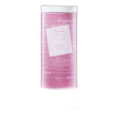 Różowa puszka z herbatą Ronnefeldt Tea Couture Love You, o pojemności 100 g. Zielona herbata z nutami pomarańczy, trawy cytrynowej i jagód, idealna na romantyczne chwile.