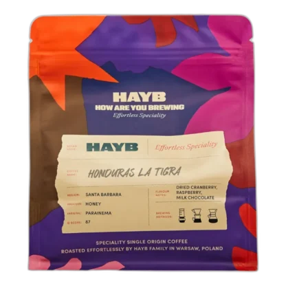 Opakowanie kawy speciality HAYB Honduras La Tigra z regionu Santa Barbara, charakteryzującej się nutami suszonej żurawiny, maliny i mlecznej czekolady. Energetyczna kolorystyka opakowania nawiązuje do unikalnego procesu obróbki honey, który nadaje kawie wyjątkową słodycz i bogaty aromat.