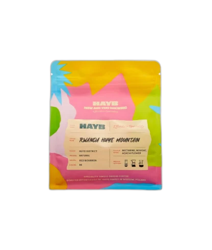 Hayb Rwanda Huye Mountain 250 g – kawa ziarnista z regionu Huye District, obróbka naturalna, odmiana Red Bourbon, nuty nektarynki, nugatu i kwiatu akacji, opakowanie w kolorach żółtym, różowym i błękitnym.