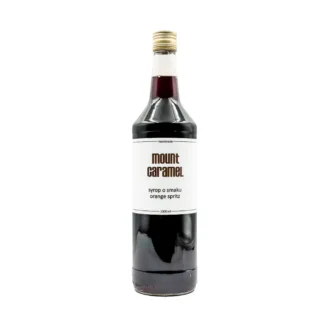Szklana butelka syropu Mount Caramel o smaku orange spritz, idealna do kawy i napojów. Produkt ręcznie robiony, doskonały do wzbogacenia smaków zimnych i gorących napojów, dostępny w sklepie internetowym.